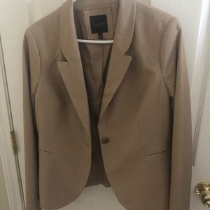 Limited tan pant suit with additional skirt